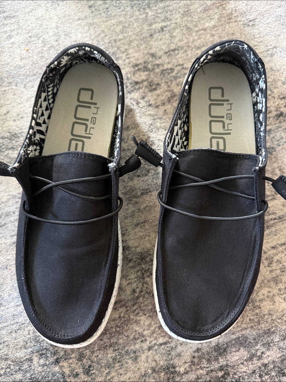 Hey Dude Women’s Casual Slip-On Shoes in Black and White